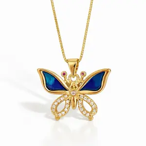A35. Blue crystal butterfly necklace 20”/ laminado 14k/ gold plated
