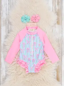 Ocean Breeze Stripe Ruffle Rashguard