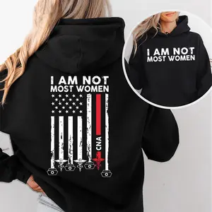 [Made in USA] I Am Not Most Women CNA Hoodie, Patriotic CNA Thin Red Line Pullover Hoodie, Distressed American Flag Nurse Graphic Hoodie, Certified Nursing Assistant Hoodie, Nurses Week CNA Gift For Women Healthcare Worker