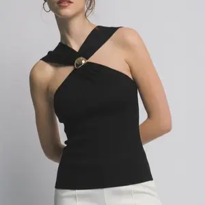 Ester0014-Knitted top with a twisted halter neck and gold sphere detail.