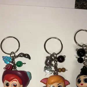 Flying boy characters doorables keychains