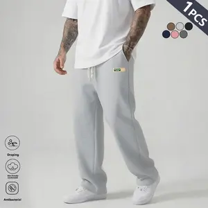 Men’s casual athletic fashion loose-fit sweatpants, 100% polyester, slight stretch, regular fit, all-season solid color straight wide-leg pants lightweight breathable fabric with an elastic waistband and drawstring, casual wear Elastic-Waist Jogger