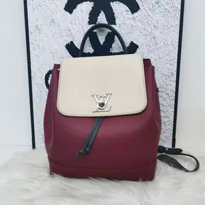 Pre-owned Louis Vuitton Cowhide Shoulder Bags LOCKME Mini Red Calfskin Backpack/Shoulder Bag
