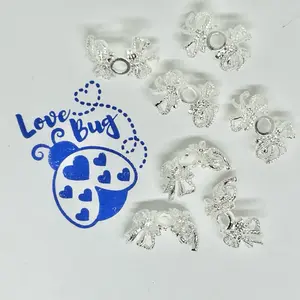 20 pieces metal bow bead caps perfect for any beatable project, including pens, keychains, wristlets. Elevate your style with a simple bead cap.
