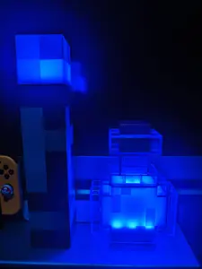 Pixelated L.E.D multi-color changing wall torch & Pixelated multi-color changing potion