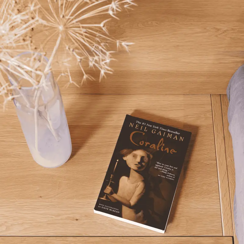 Coraline 10th Anniversary Edition by Neil Gaiman [Paperback Book] A chilling tale of courage and curiosity for all ages.