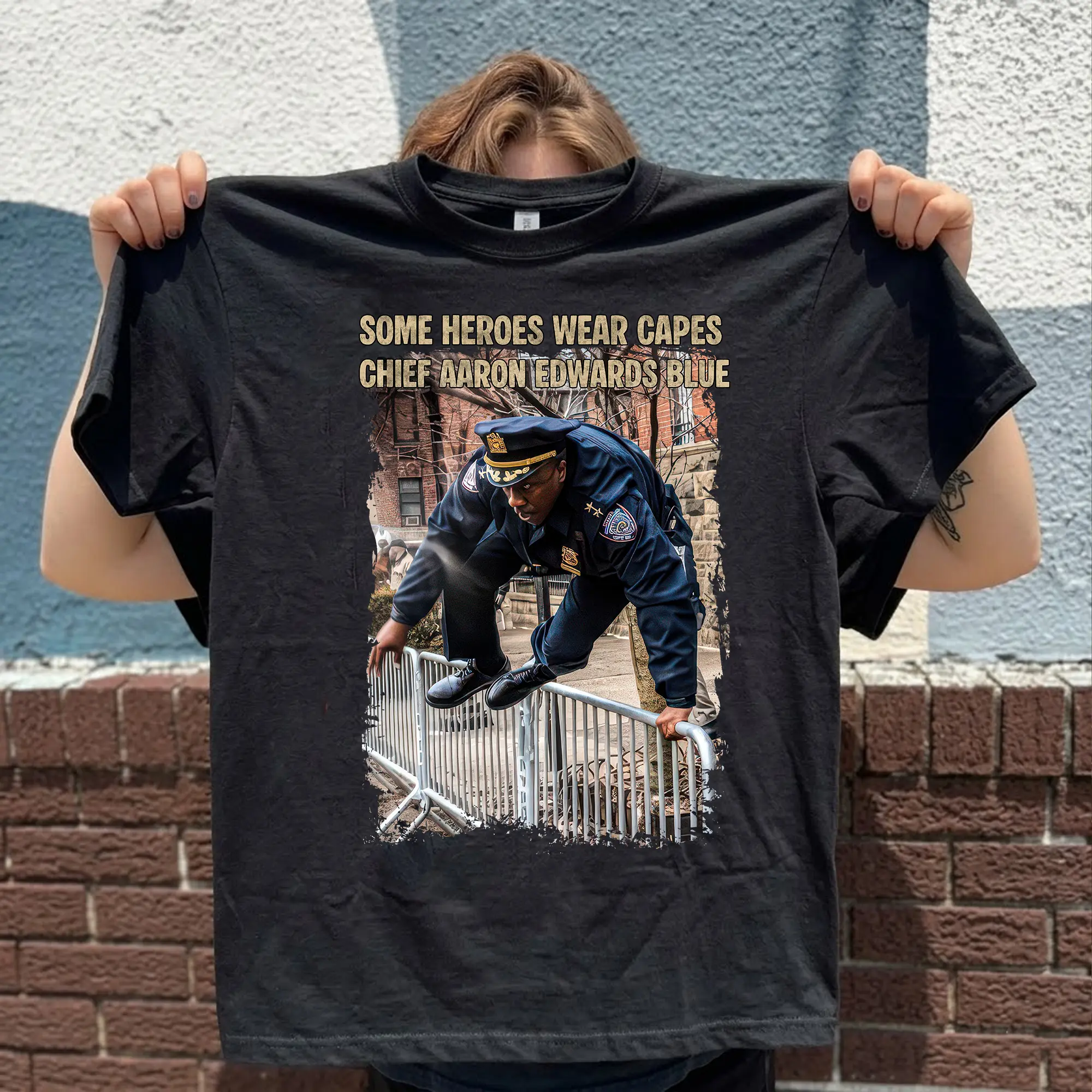 Some heroes Wear Capes — Chief Aaron Edwards Wears Blue Shirt