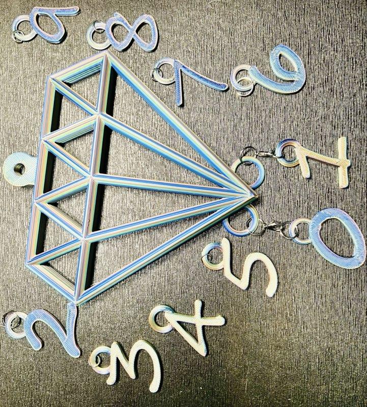 3D Printed Wall Decor Counter with Unique Holographic Design and Durable Materials.