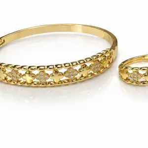 Gold-Tone Bracelet and Ring Set with Floral Design and Crystal Accents