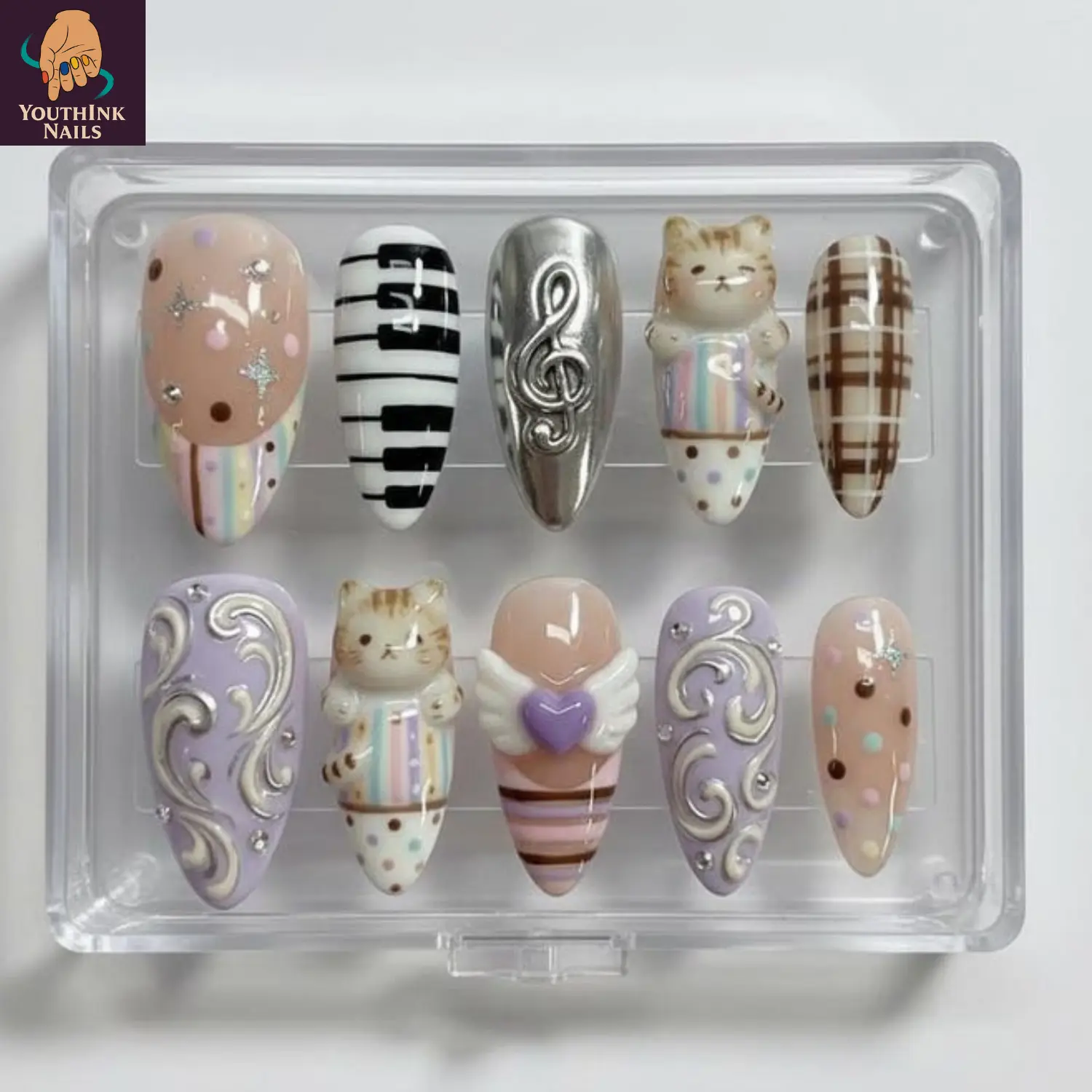 Cute Music Cat Pastel Press On Nails, handmade 3D gel nail art with piano keys, silver music note, cat charm, heart wings, pastel lavender nude tones, playful Y2K aesthetic, reusable press on nails for daily wear, birthday gift, sweet statement style