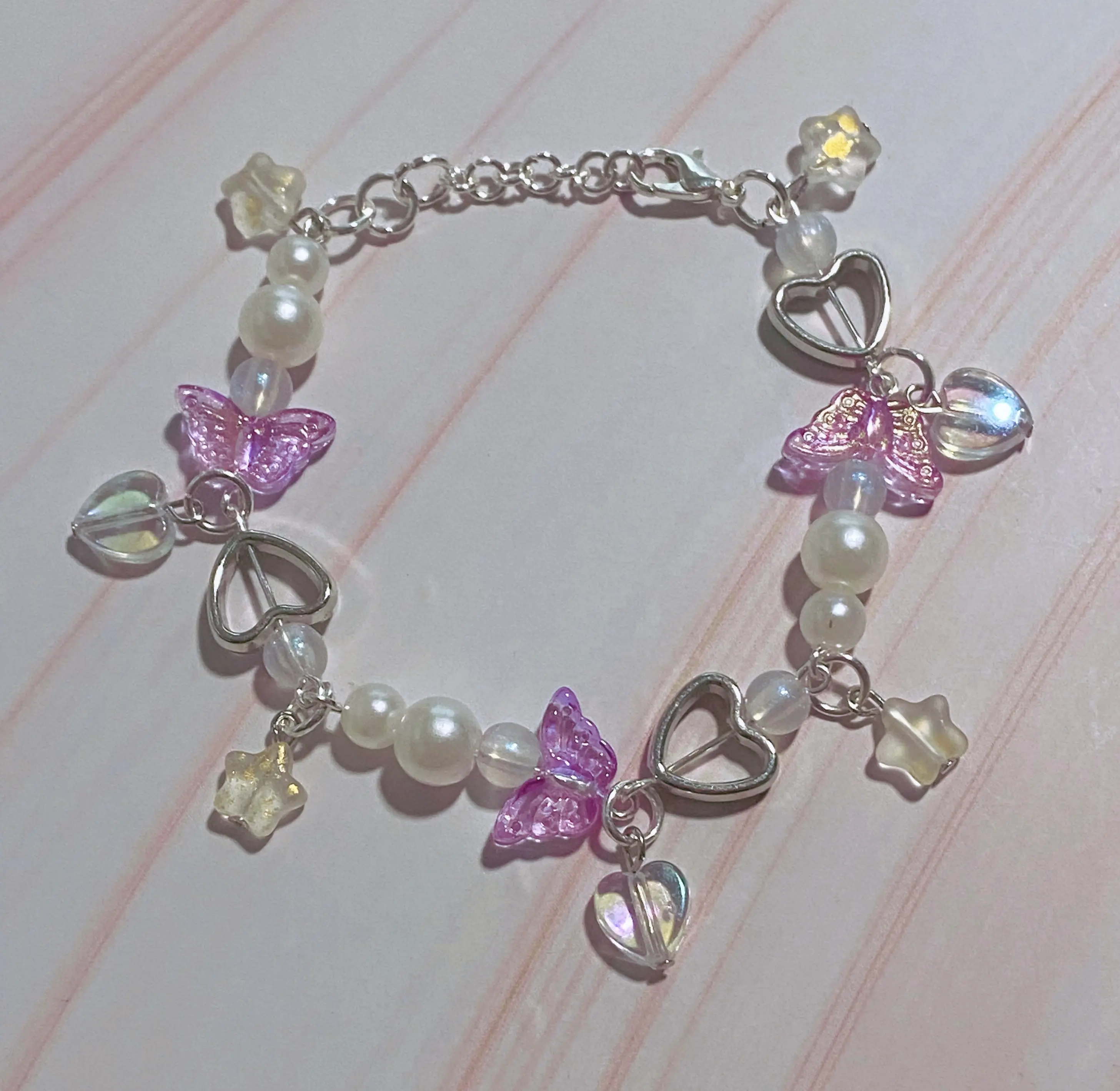 Purple Butterfly Charm Bracelet with Coquette Pearl Beading and Heart Charms