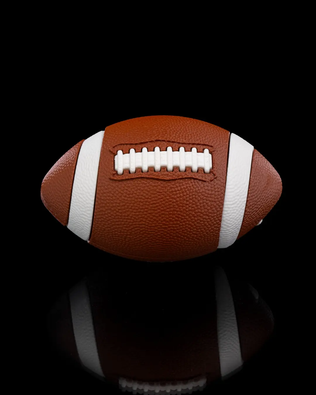 3DFabLabHTX presents - Introducing the 3D Printed Spiral Passthrough Football: The perfect blend of sports and stress relief!