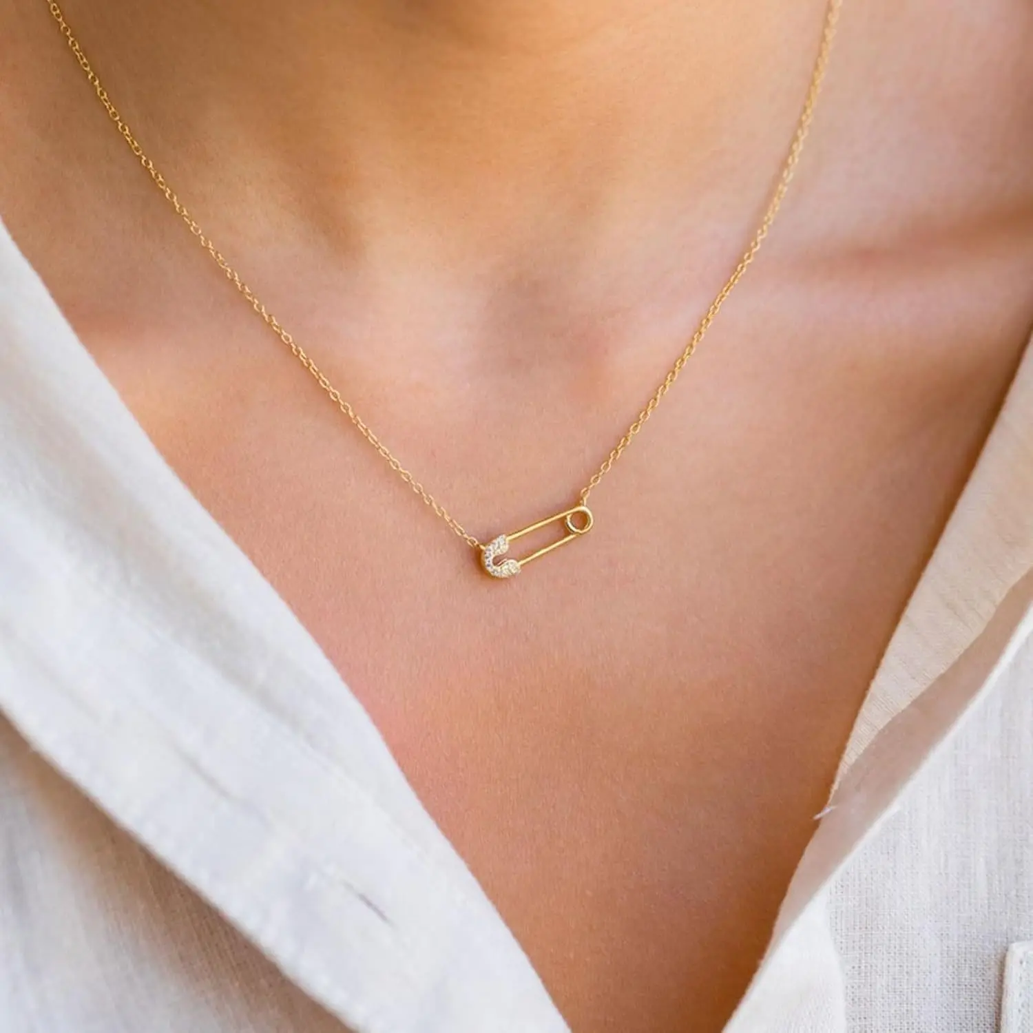 Golden zircon paperclip necklace