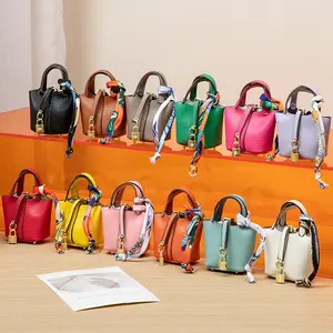 BOOVO Mini Jewelry Pouch with Keychain, Portable PU Leather Travel Jewelry Case, Aesthetic Small Jewelry Organizer Bag for Women, Chic Bag Charm for Tote Bags