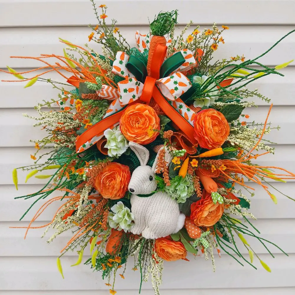 Cream Bunny Wreath with orange, green, and white flowers and a bow, perfect for spring or Easter