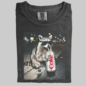 Three Raccoons Diet Coke Comfort Colors T-Shirt with a funny Gen Z dank meme vibe, trendy cotton streetwear top and playful graphic gift for men and women alike.