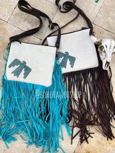 Black or blue fringe- Tooled Leather Tunderbird hair-on hide crossbody