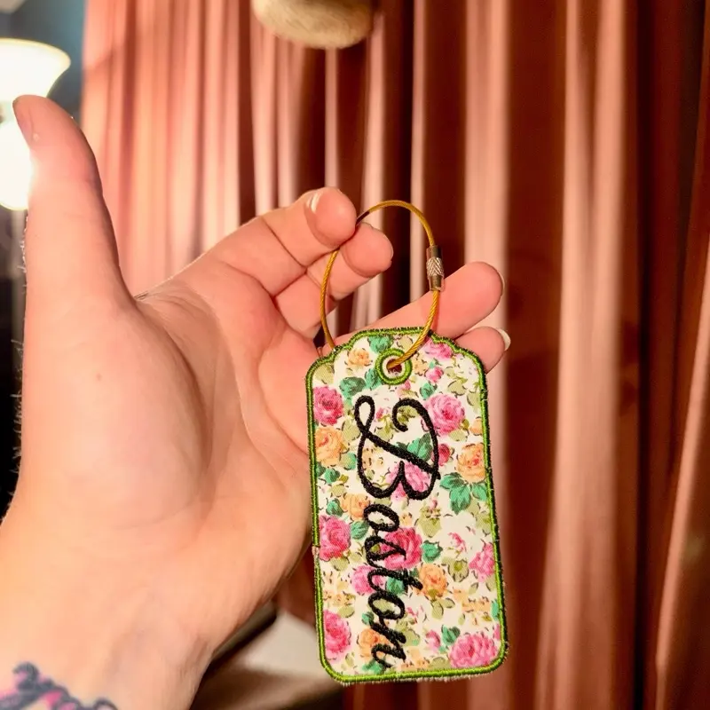 Handmade fabric, and embroidered bag tags