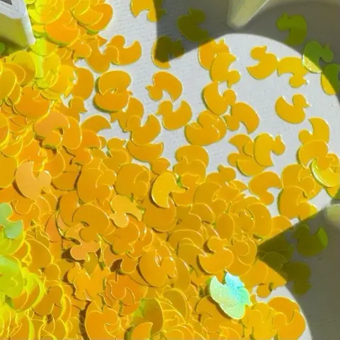 Glitter shapes, and Polyclay - Flower Designs and more.y