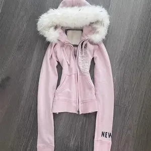 Retro American pink faux fur hooded sweatshirt with waistband cut sweater can be paired with raincoat instead of outerwear
