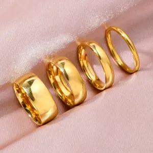 A set of four simple and versatile fashion rings, 18k gold plated, can be worn together with different thicknesses, suitable for everyday wear, as gifts, or for parties.