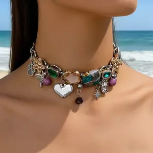 Vintage hand-painted enamel ocean pet pendant necklace with star pendants. A bohemian-style layered chain piece, perfect for women's travel, casual wear, and music festival attire. Unique craftsmanship and design make it the perfect holiday gift.