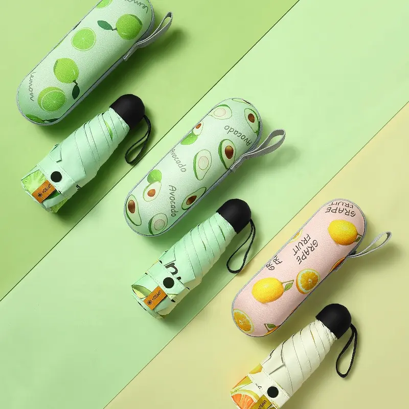 Mini Pocket Fruit Umbrella with UV Protection UPF 50+ Compact Travel Sun Rain Parasol for Women Girls Lightweight Windproof Small Folding Umbrella with Cute Capsule Carrying Case Lemon Avocado Design