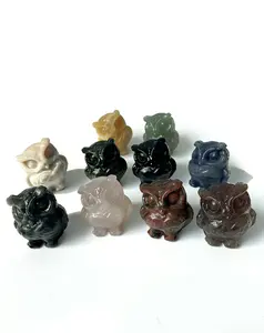 Various materials' owl crystal carvings