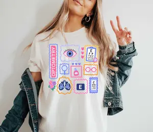 Cute Optometry Tshirt with Eye Exam Icons, Pastel Pink Vision Care Crewneck, Optometrist Gift for Eye Doctors and Students Sweatshirt
