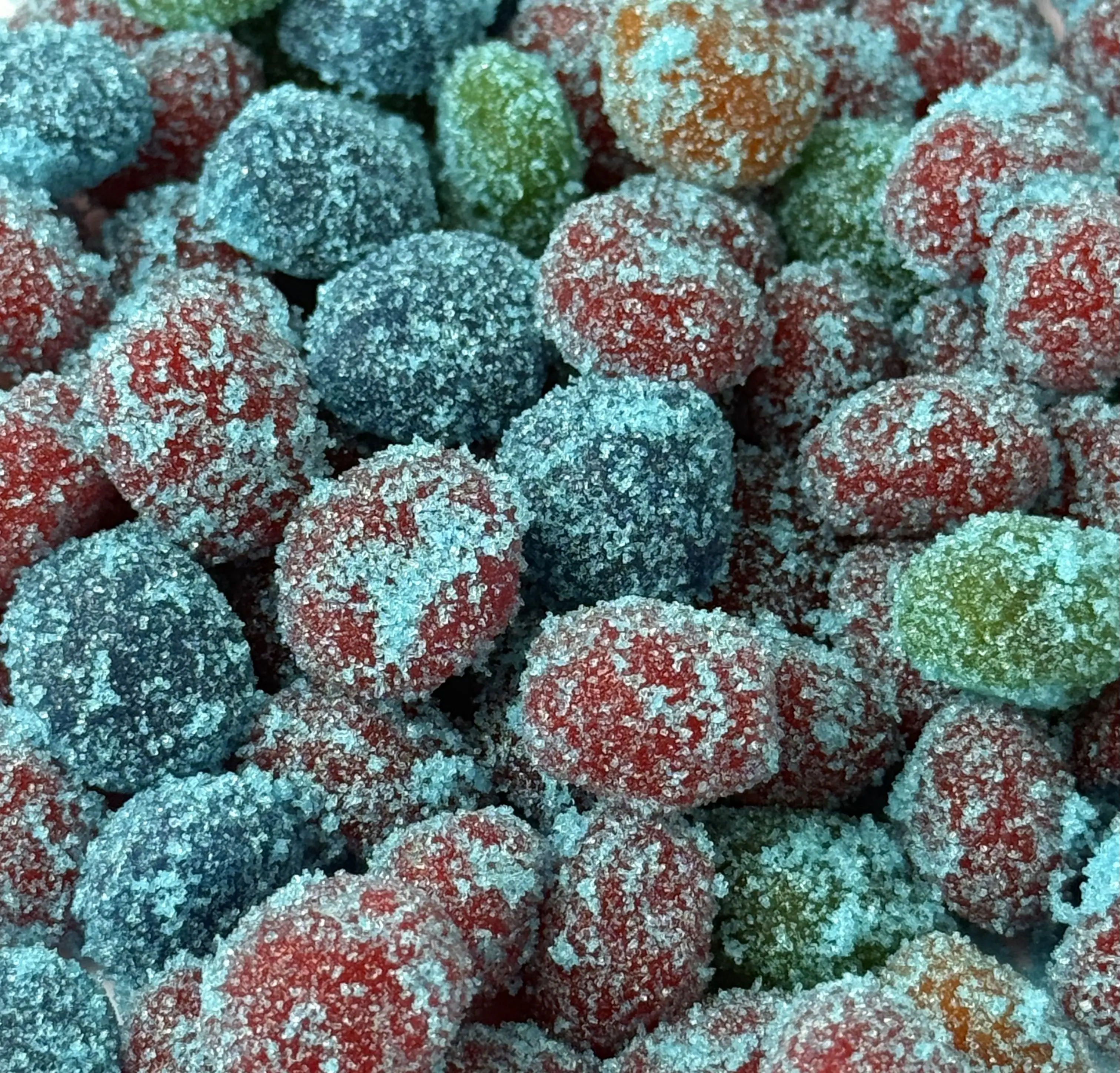 Sour Gusherz Coated in sour flavored powder - Blue Raspberry, strawberry, green apple - Sour then sweet coated gusherz