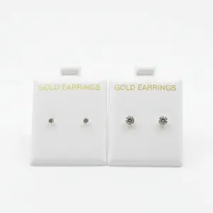 Aretes pequeños en Oro 10K con cierre a presión