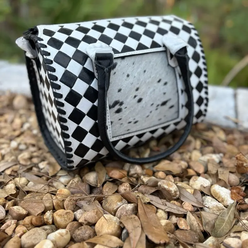 Medium Black and white Checkered and Cowhide Speedy Crossbody Purse. 12x8x9”