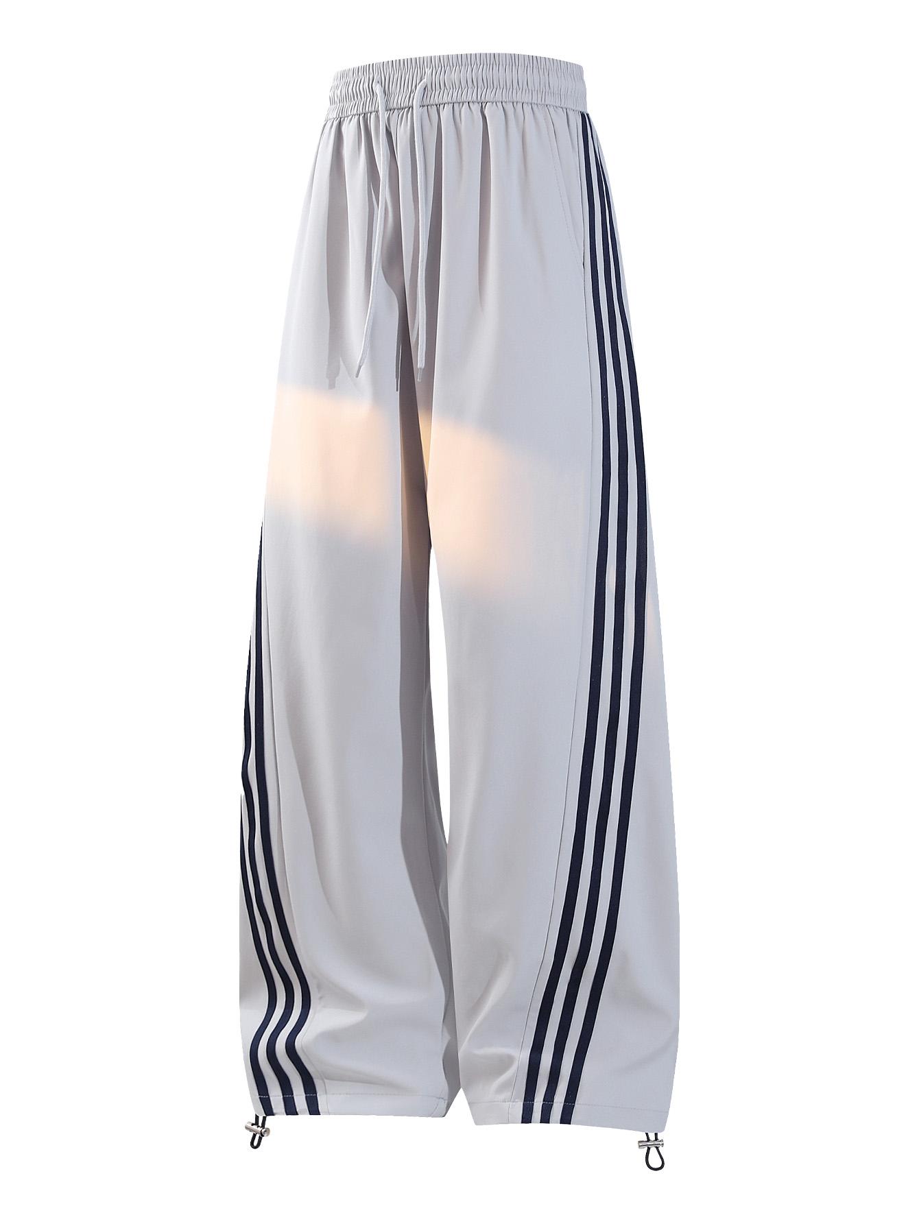 CCCMAI Men's color-block side stripe sports pants, all-season men's casual fashion trendy straight-leg pants with drawstring waistband, classic menswear sweatpants, loose casual pants, stylish activewear for men. Striped