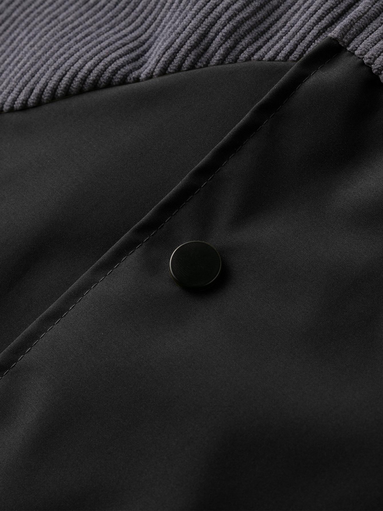 A collared jacket with a patchwork style, visually layered and designed to flatter necklines. The buttoned closure makes it easy to put on and take off. There is one pocket on the left side which is both practical and decorative