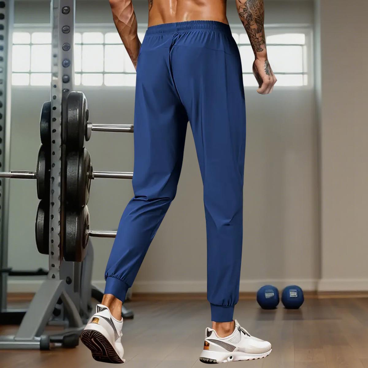 Men’s sports pants, zippered pocket jogging pants, fitness sports pants, all-season versatile athletic set, sports pants, activewear, casual sports pants, sporty design, lightweight running pants, comfortable materials solid color basic style