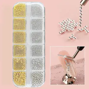 DIY mini small pearl beads stainless steel bead nail decorations in gold color. These are various-sized nail ornaments sets for daily manicures, These colorful pearl beads will make your nails stand out.   Kit diamond curing Rhinestones Mix woman shiny
