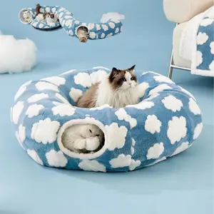 Cat Tunnel Bed – A cozy experience designed for cats and small dogs. A 2-in-1 foldable cat tunnel and bed, featuring a warm plush design with hanging ball and tunnel clips. Suitable for both indoor and outdoor use — versatile pet supplies.